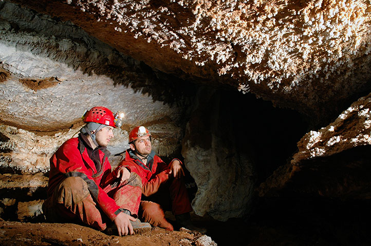 Spelunkers in a cave